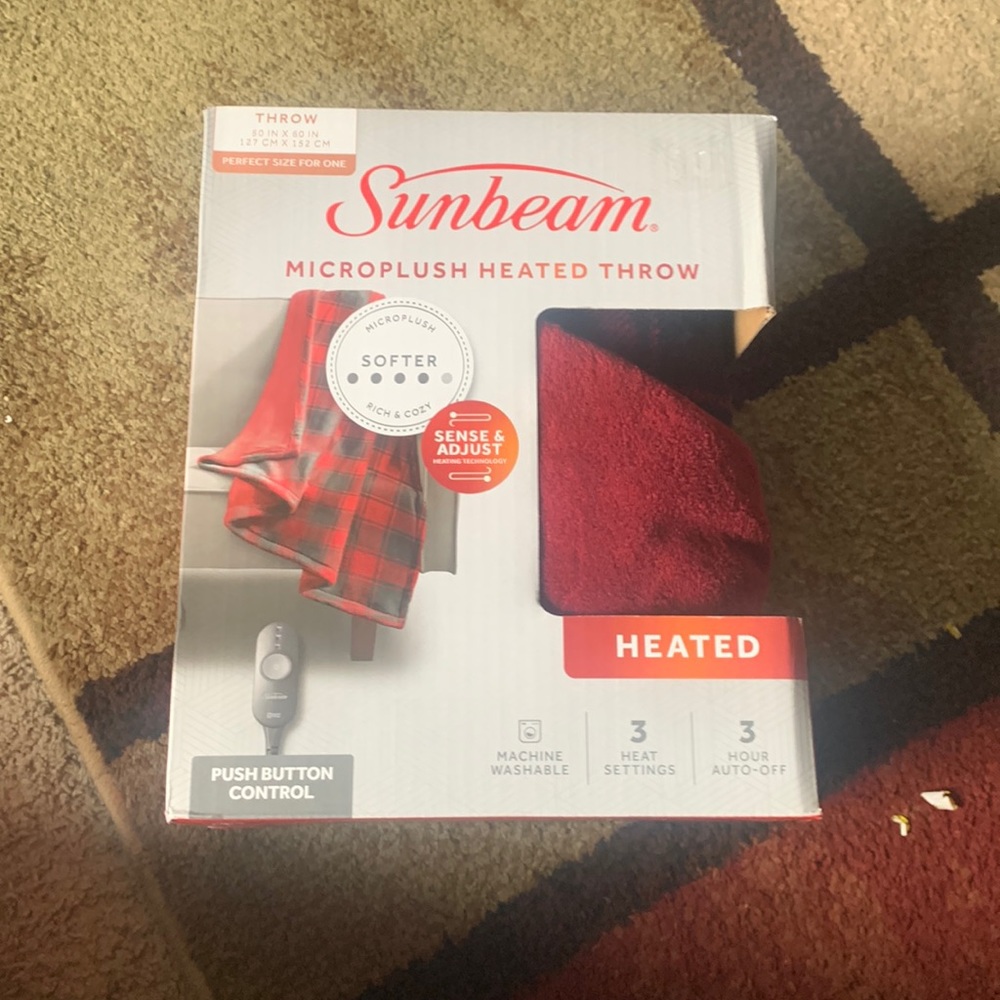 Heated throw blanket